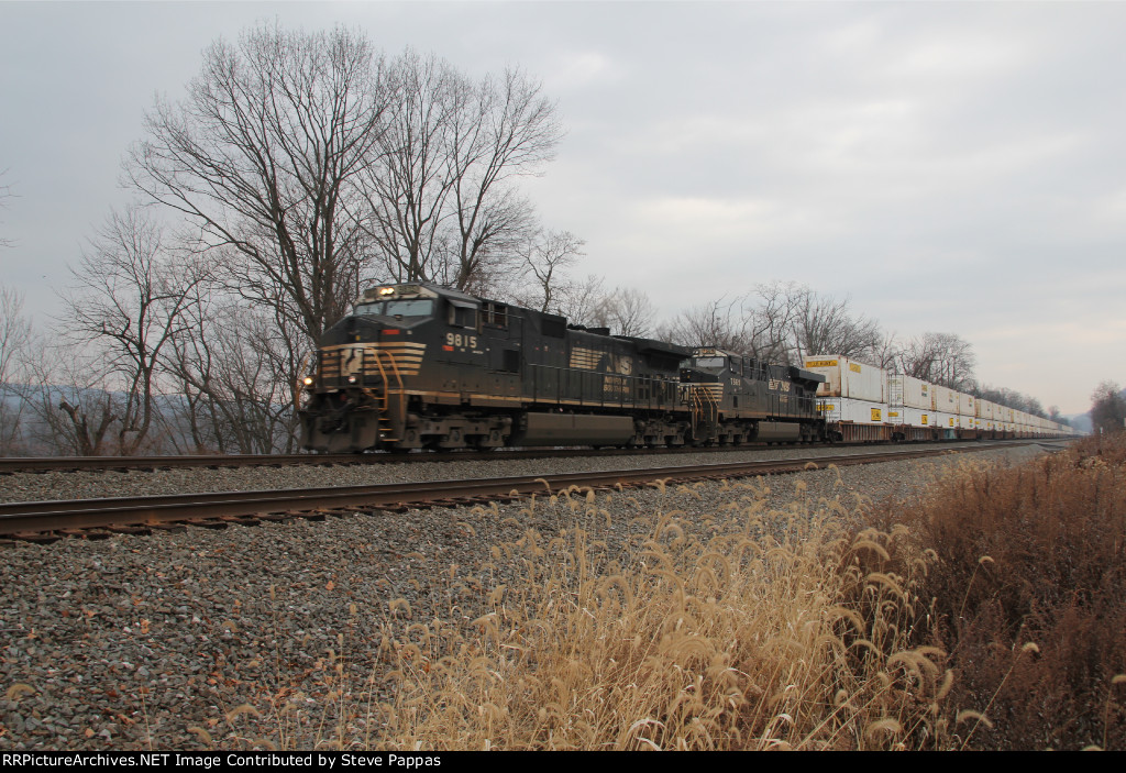 NS 9815 with train 21G at MP 116